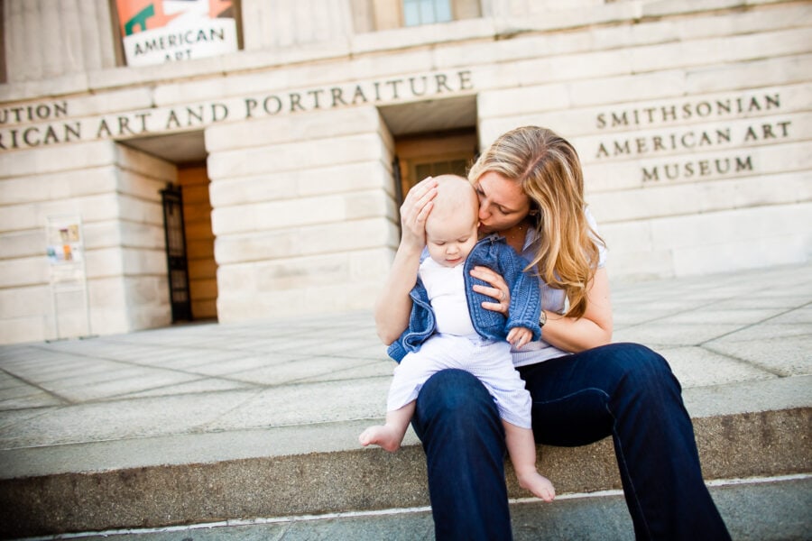 Photo of mother and baby boy on the steps of Smithsonian American Art Museum by Washington DC baby photographer Julie Kubal. Photograph copyright ©2010 Julie Kubal.