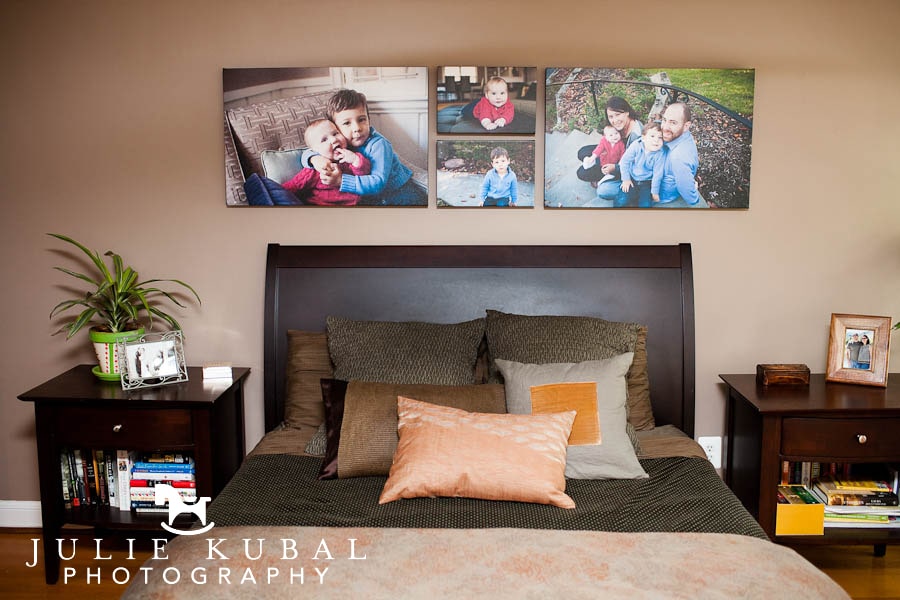 Family photos displayed above headboard in parents' bedroom adds beauty and personalization to the space.