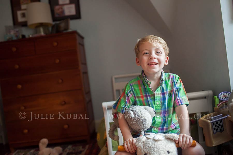 Little boy in bedroom  photographed in family home before move