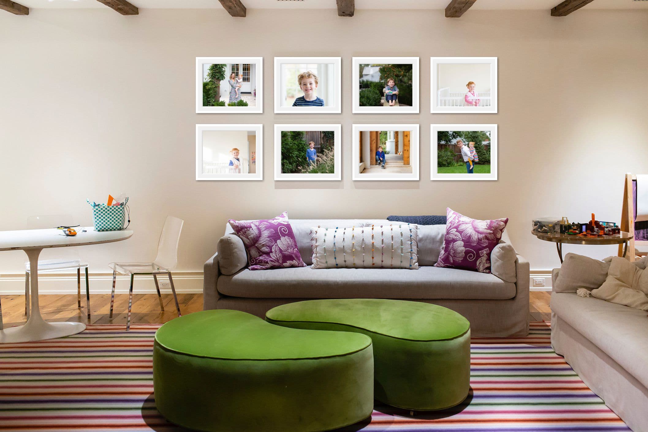 a grid of matching frames is a creative way to display family photos, as shown in this home, designed for clients in Chevy Chase by Julie Kubal.