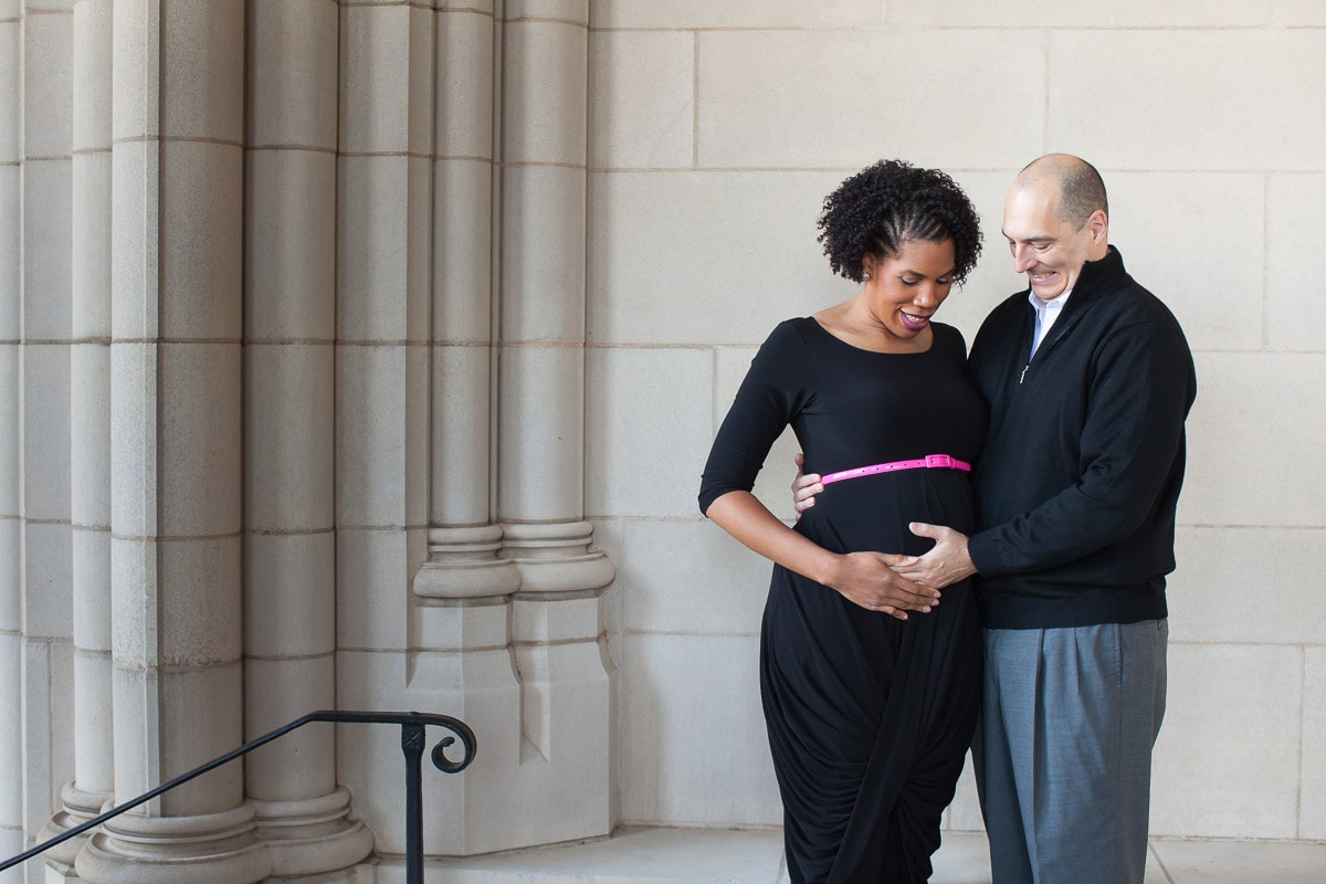 photo of pregnant woman and her husband by one of the top maternity photographers in DMV